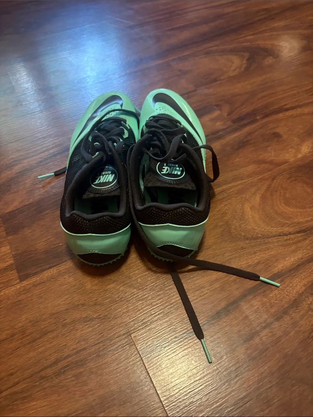 Nike Mint Green and Black track shoes